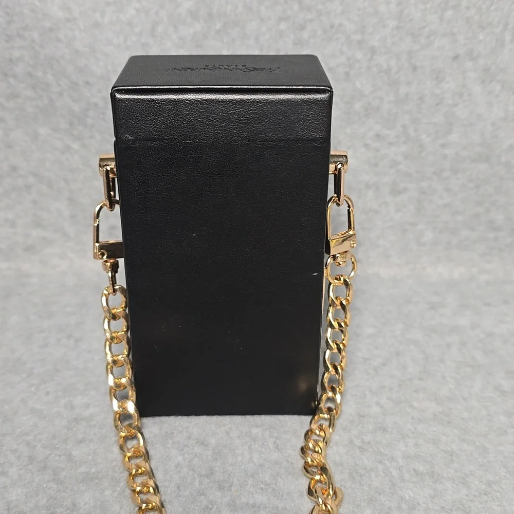Yves Saint Laurent Beaute Black and Gold Mini Bag